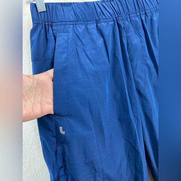 NEW Lolë Wander Track Pants Womens size Medium Blue Nylon Athletic Activewear - Picture 13 of 15